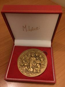 Here's another of the gifts we received - a beautifully crafted medallion to commemorate the 50 years of the Synod. It shows the Risen Christ surrounded by the Apostles. On the back are the coats of arms of Paul VI and Francis. 